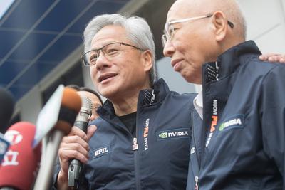 Jensen Huang, NVIDIA founder and CEO and C.W Tsai, SPIL chairman, answer questions after the opening ceremony of new Tai-stock-photo