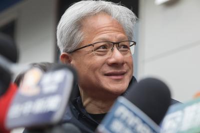 Jensen Huang, NVIDIA founder and CEO and C.W Tsai, SPIL chairman, answer questions after the opening ceremony of new Tai-stock-photo