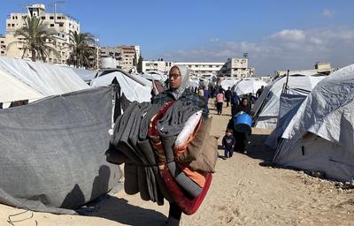 Displaced Palestinian families in Gaza City begin moving their tents and personal belongings back to their homes-stock-photo