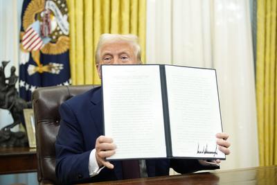 President Trump signs an Executive Order-stock-photo