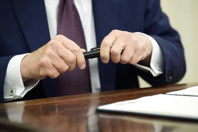 President Trump signs an Executive Order-stock-photo