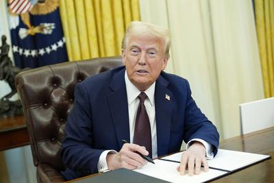 President Trump signs an Executive Order-stock-photo