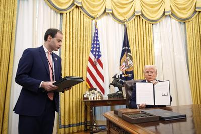 President Trump signs an Executive Order-stock-photo