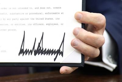 President Trump signs an Executive Order-stock-photo