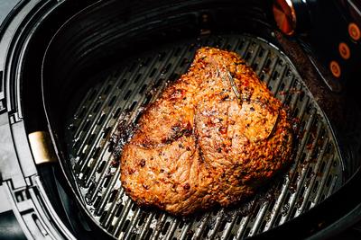 Grilled flank beef steak with rosemary Grilled flank beef steak with rosemary, prepared in airfryer Copyright: xZoonar.c-stock-foto