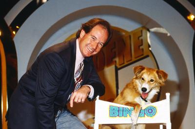 Die Goldene 1 Max Schautzer, deutscher TV Moderator, mit Hund in der Spielshow Die goldene Eins , Deutschland um 1992.,-stock-photo