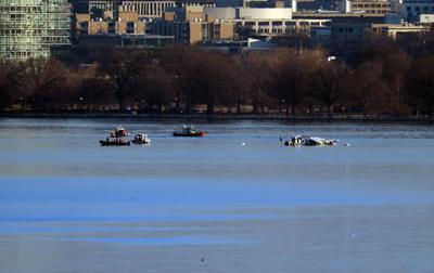 Rescue Crews Search for Remnants of American Airlines Airplane Crash-stock-foto