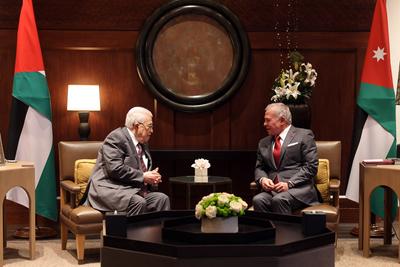 Jordan's King Abdullah II receiving Palestinian President Mahmud Abbas in Amman-stock-photo