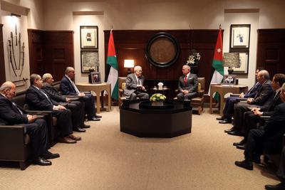 Jordan's King Abdullah II receiving Palestinian President Mahmud Abbas in Amman-stock-photo