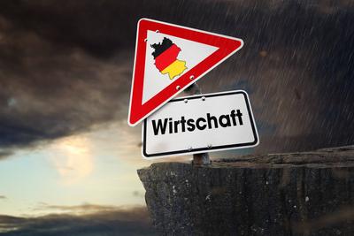 13 December 2024: Warning sign with a map of Germany and the inscription:Economy, on the brink. Symbolic image of the Ge-stock-foto