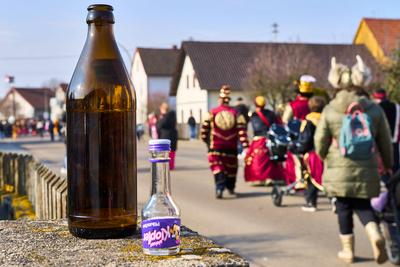 Mertingen, Bavaria, Germany - February 9, 2025: Symbolic image of alcohol consumption and carnival. Beer bottles or alco-stock-foto