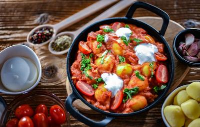 Creamy tomato gnocchi with burrata Creamy tomato gnocchi with burrata, basil and garlic. Copyright: xZoonar.com/monticel-stock-foto