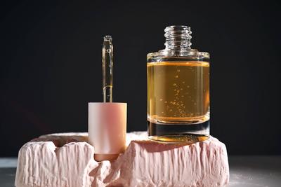 Bottle with yellow serum in Steel Life. Bottle with yellow serum in Steel Life. High quality photo. Copyright: xZoonar.c-stock-foto