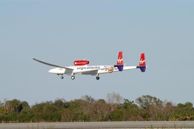 KENNEDY SPACE CENTER, FLA. - The Virgin Atlantic Airways GlobalFlyer aircraft approaches NASA Kennedy Space Center"!s Shu-stock-photo