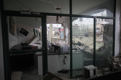 Residents inspect the damage done as Israeli troops withdraw from Al Farea refugee camp following a four-day campaign, near the West Bank city of Tubas-stock-photo