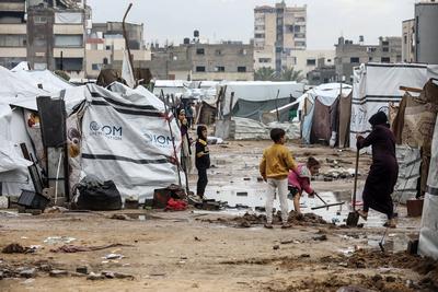 Displaced Palestinians take shelter in tents set up at the Yarmouk stadium in Gaza City-stock-photo