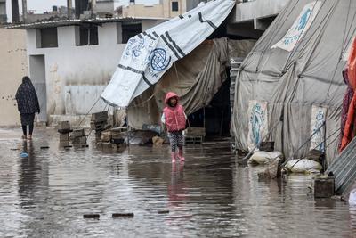 Displaced Palestinians take shelter in tents set up at the Yarmouk stadium in Gaza City-stock-photo