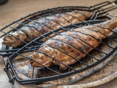 Two grilled trout fish Two grilled whole trout fish ready for serving Copyright: xZoonar.com/RomanxMilertx 20714567-stock-foto