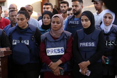 Palestinian journalists participate in a protest against Israeli crimes against journalists in Gaza, Deir al-Balah Pales-stock-photo