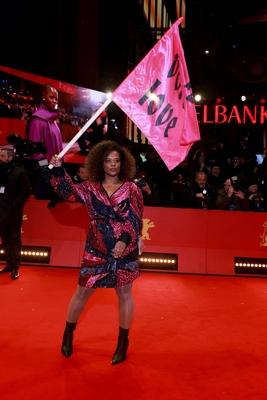 13.02.2025, Denise M Baye mit Fahne bei der Er?ffnung der 75. Berlinale, Internationale Filmfestspiele Berlin, Roter Tep-stock-photo