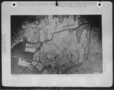 This vertical view of Tokyo, Japan taken after the attacks on 9/10 March 1945, shows within the black borders, the area-stock-foto