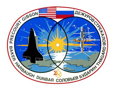 STS071-S-001 (April 1995) --- The STS-71 crew patch design depicts the orbiter Atlantis in the process of the first inte-stock-photo