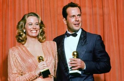 Cybill Shepherd and Bruce Willis, stars of Moonlighting , at the 44th Annual Golden Globe Awards, 1987 ? JRC /The Holly-stock-foto