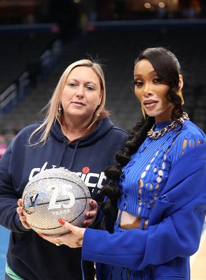 WASHINGTON, D.C. - DECEMBER 28: Winnie Harlow with Karri Kuzma, mother of Kyle Kuzma, hold a commemorative ball honorin-stock-photo