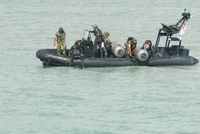 10 March 2014 Malaysia The search and rescue efforts for the missing MH370 intensifies on the 3rd da-stock-foto