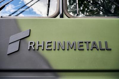 Volkach, Bavaria, Germany - October 1, 2024: Rheinmetall AG lettering on a Rheinmetall HX military truck in camouflage c-stock-foto