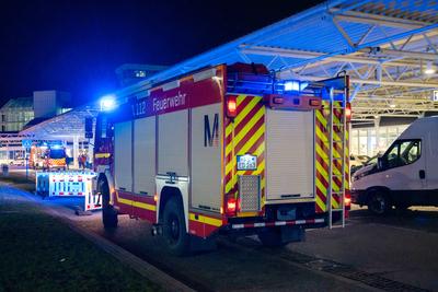 Munich, Bavaria, Germany - February 26, 2025: The Munich Airport Fire Department with blue lights in front of Terminal 1-stock-foto
