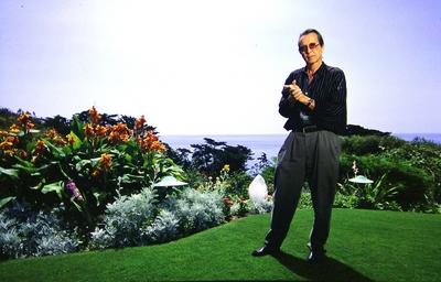 STOCK 1982- Herb Alpert plays trumpet in the garden of the Malibu home he has lived in with his wife Lani since 1974. No-stock-photo