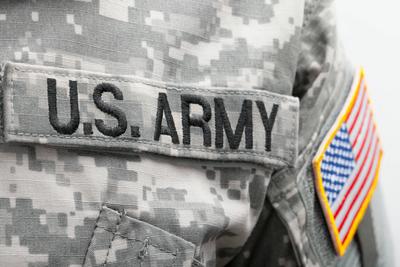 USA flag and US Army patch on solder s uniform USA flag and US Army patch on solder s uniform ,model released, Symbolfot-stock-photo