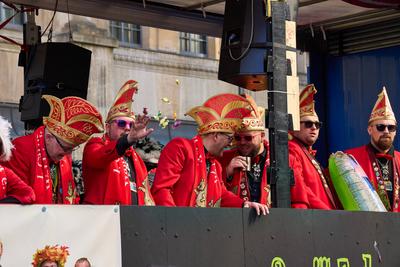 Karlsruhe, Baden-W?rttemberg, Germany - March 4, 2025: A group of carnival performers throw sweets into the crowd during-stock-photo