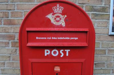 Copenhagen, Denmark /13 November 2023/. denamrk s one royal mail box one pride of denamrk there are still few are seen o-stock-photo