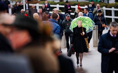 Lynne Brown from Gloucester makes her way to racecourse ahead of Day 2 of the Cheltenham Festival 12/3/2025-stock-photo