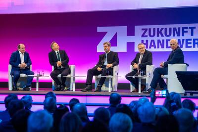 Munich, Bavaria, Germany - 12 March 2025: Wolfram Kons (Moderator), Dr. Robert Habeck (B?ndnis 90, Die Gr?nen), Dr. Mark-stock-photo