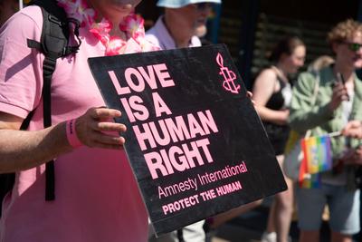 People and supporters parading at the pride parade at Canterbury city in Kent UK Canterbury, Kent, United Kingdom, June-stock-photo