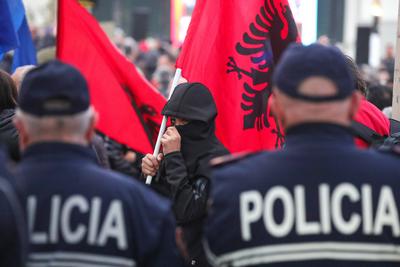 Opposition Protest against government in Tirana A supporter of the opposition centre right Democratic Party holds a part-stock-foto
