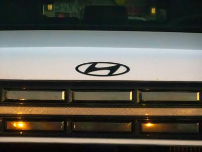 Calgary, Alberta, Canada. Jan 29, 2025. Hyundai logo detail, close-up on vehicle branding. Symbol of quality and innovation.-stock-photo