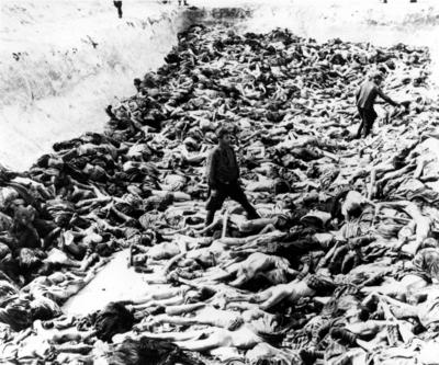 Bergen-Belsen Concentration Camp. A mass grave dug after the camp has been turned over to the Allied 21st Army Group. 55-stock-photo