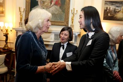 King Charles and  Queen Camilla at Clarence House reception-stock-photo