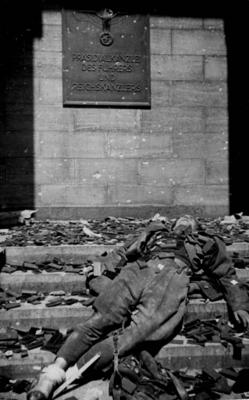 WW2 Body of a dead German soldier outside the Reichs Chancellery Berlin 1945 Mono Print AUFNAHM-stock-photo