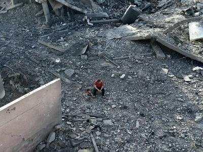 Palestinians inspect the area after Israeli attack over Khan Yunis-stock-photo
