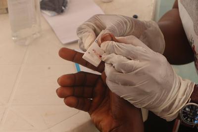 World Malaria Day Two NGOs organized free malaria test for residents in Lagos Island area of Lagos state, Nigeria?s comm-stock-photo