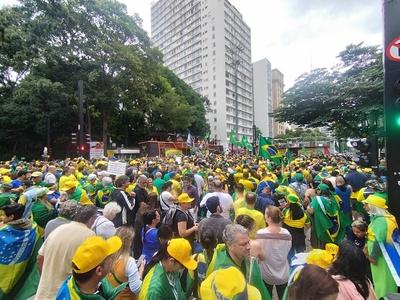 Protesters arrive for amnesty demonstration on Paulista Avenue in Sao Paulo-stock-photo