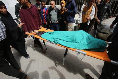 Injured Palestinians are taken to al-Ahli Baptist Hospital for medical treatment following the Israeli attack-stock-foto