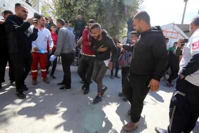 Injured Palestinians are taken to al-Ahli Baptist Hospital for medical treatment following the Israeli attack-stock-foto