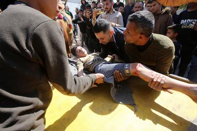 Injured Palestinians are taken to al-Ahli Baptist Hospital for medical treatment following the Israeli attack-stock-foto