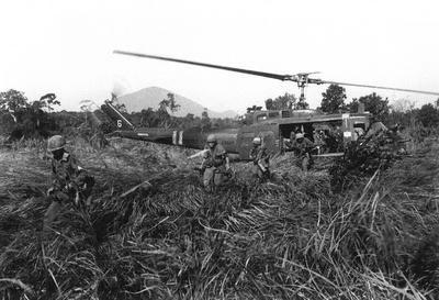 RECORD DATE NOT STATED Vietnam: US infantry attacking from a Huey UH-1D helicopter, Central Highlands, 1966 The Second I-stock-photo